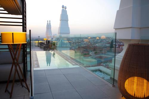 a view of a city from a building at Riu Plaza España in Madrid