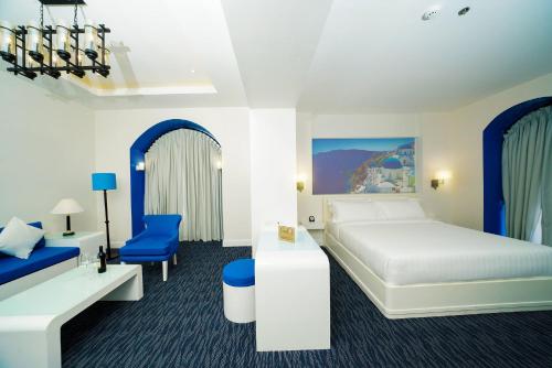 Tempat tidur dalam kamar di Hotel Carlito Tagaytay