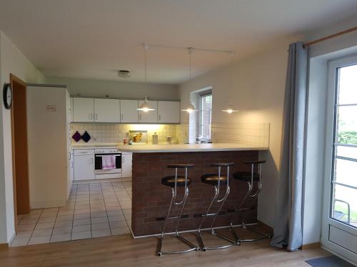 Η κουζίνα ή μικρή κουζίνα στο Ferienhaus Weltblick