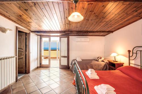 Кровать или кровати в номере Heart and Soul of Sorrento