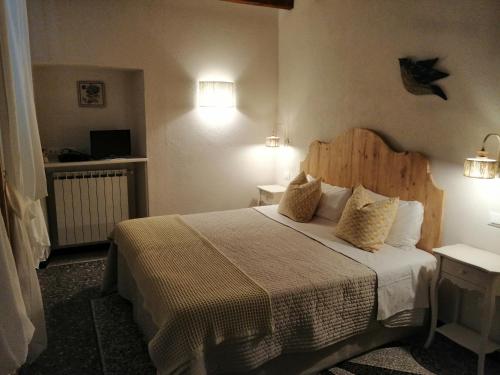 A bed or beds in a room at B&B Alle Ortensie Blu