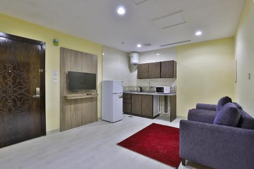 Kuchyň nebo kuchyňský kout v ubytování Shahad Alola Serviced apartments
