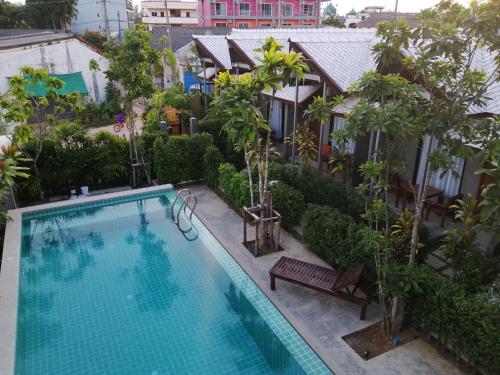 an overhead view of a swimming pool at a hotel at JR Place in Klong Muang Beach