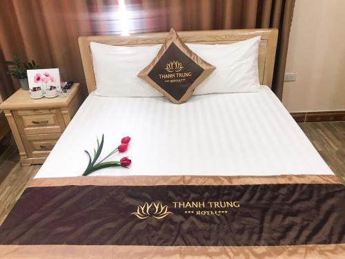 Ένα ή περισσότερα κρεβάτια σε δωμάτιο στο Thanh Trung Hotel