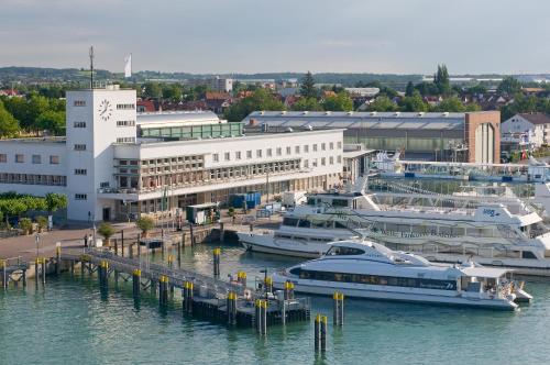 a group of boats docked at a marina at Ringhotel Krone in Friedrichshafen