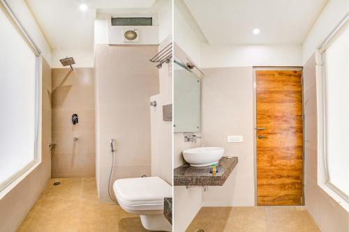 a bathroom with a toilet and a sink at Hotel Destination in Chandīgarh