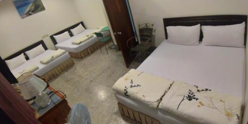 Cama o camas de una habitación en 尚武民宿 台東縣民宿382號