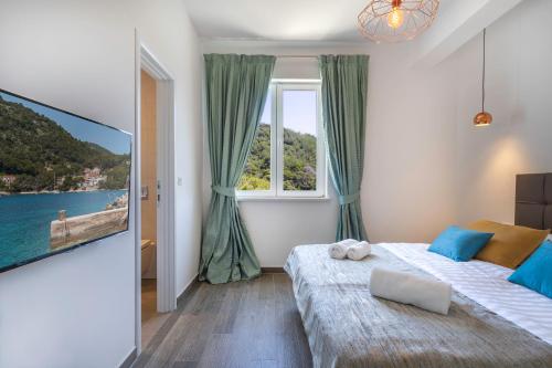 Krevet ili kreveti u jedinici u objektu Pine Tree Boutique Apartments