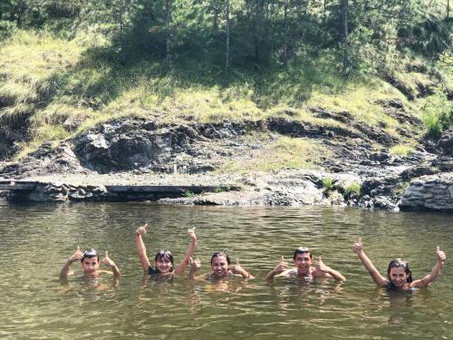 a group of people swimming in the water at Zicka plaza in Kraljevo