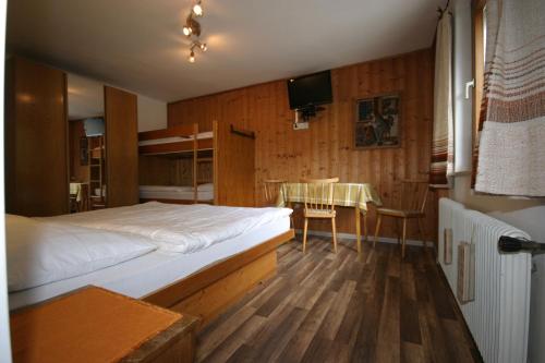 Ένα ή περισσότερα κρεβάτια σε δωμάτιο στο Appartement-Reiteralm