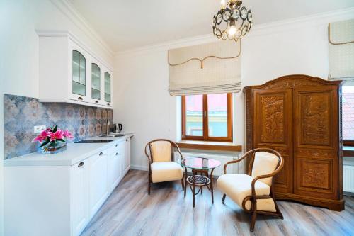 Η κουζίνα ή μικρή κουζίνα στο Apartamenty Magia