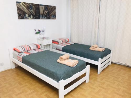 Llit o llits en una habitació de Dodis Studio Recoleta