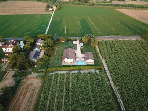 an aerial view of a house in a field at Ca Giuliocesare in Castiglione di Ravenna