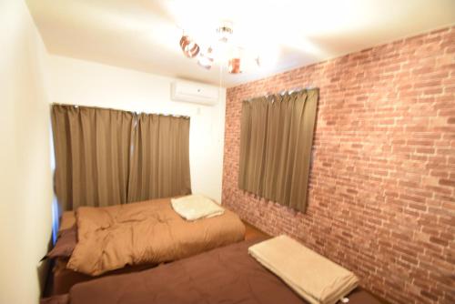 Ένα ή περισσότερα κρεβάτια σε δωμάτιο στο Hotel EL Tochigi 3 free parking