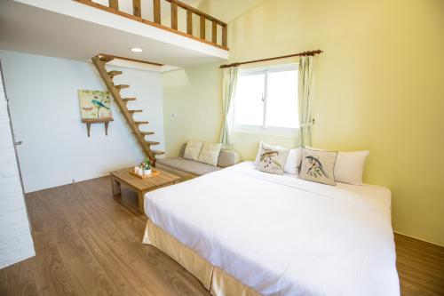 Una cama o camas en una habitación de Fish Villa 38
