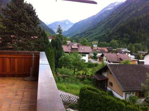 a view from the balcony of a house in the mountains at Landhaus Fuchsenstube in Schruns-Tschagguns