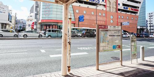 a sign on the side of a city street at Hotel Cuore Kokusai Dori Naha in Naha