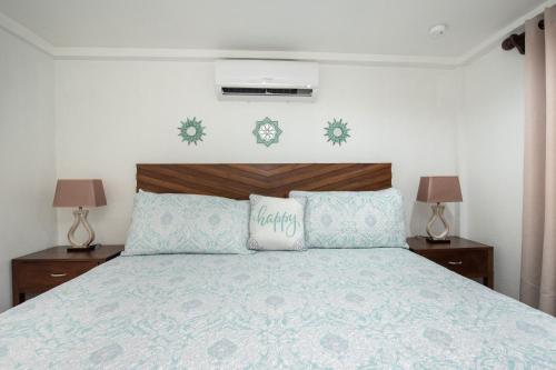 La Casa de Paz Hotel tesisinde bir odada yatak veya yataklar