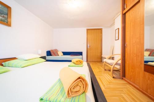 Ένα ή περισσότερα κρεβάτια σε δωμάτιο στο Cro Behar 1 Apartment