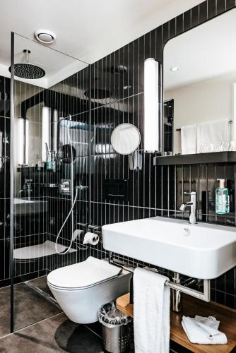 Un baño de Best Western Plus Hotel Bern