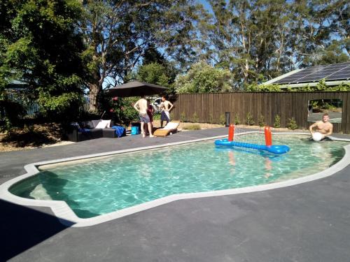 a group of people in a swimming pool at Haven Retreat in Berry