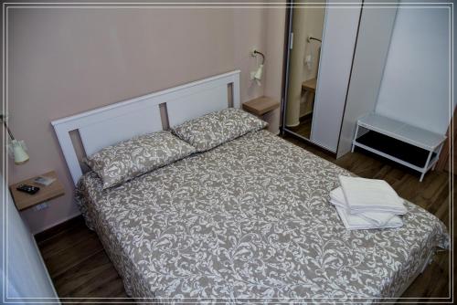 Ένα ή περισσότερα κρεβάτια σε δωμάτιο στο B&B Sicily