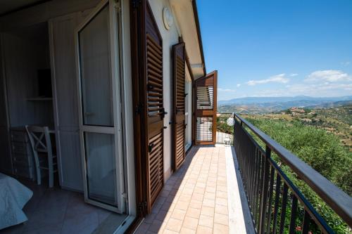 a balcony with a view of the mountains at Madonna della Scala in Castellabate