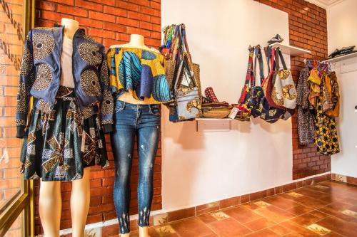 a display of clothes on mannequins in a store at High Ground Villa Ltd in Kigali