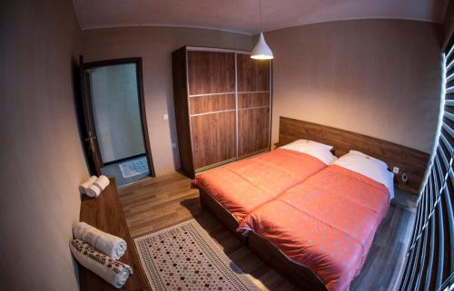 מיטה או מיטות בחדר ב-DIONIS Rooms & Apartments
