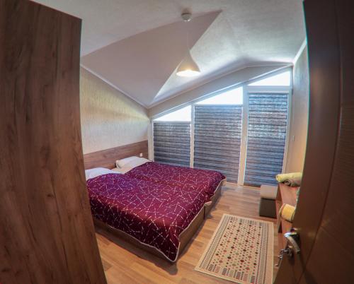 Katil atau katil-katil dalam bilik di DIONIS Rooms & Apartments