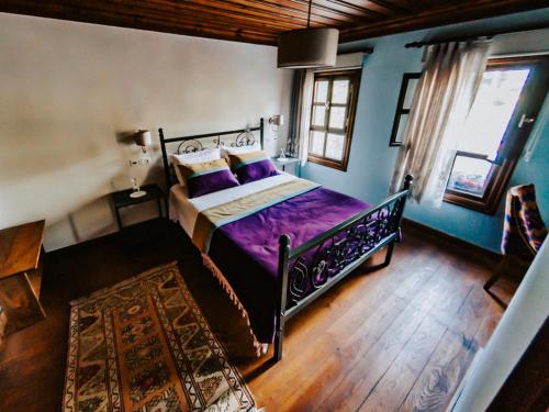 Katil atau katil-katil dalam bilik di Misgibi Hotel
