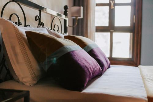 Katil atau katil-katil dalam bilik di Misgibi Hotel