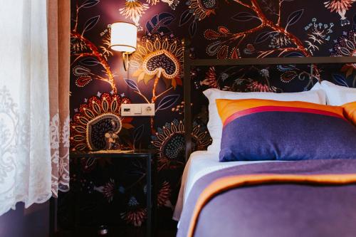 Katil atau katil-katil dalam bilik di Misgibi Hotel