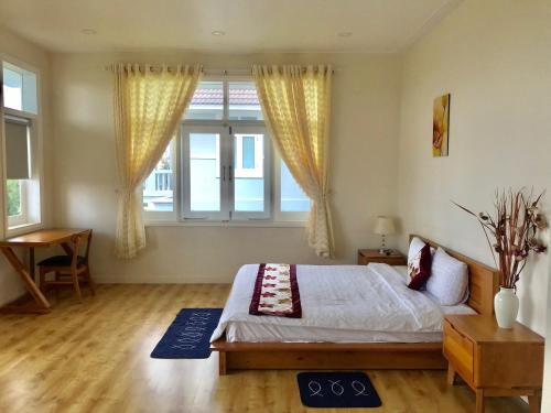 Säng eller sängar i ett rum på Villa Sea View Phan Thiet Mui Ne