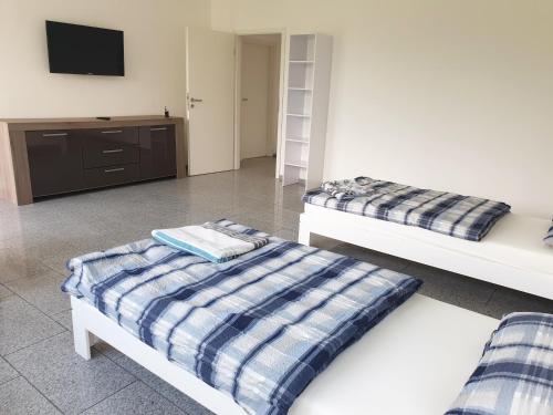 Ένα ή περισσότερα κρεβάτια σε δωμάτιο στο My-Skypalace Billigheim