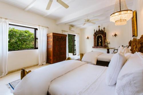 Ένα ή περισσότερα κρεβάτια σε δωμάτιο στο Hacienda San Angel