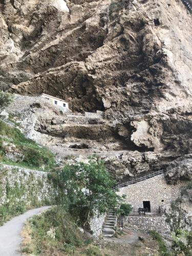 a building on the side of a mountain at Coastal Cliff, Amalfi 2 in Pianillo