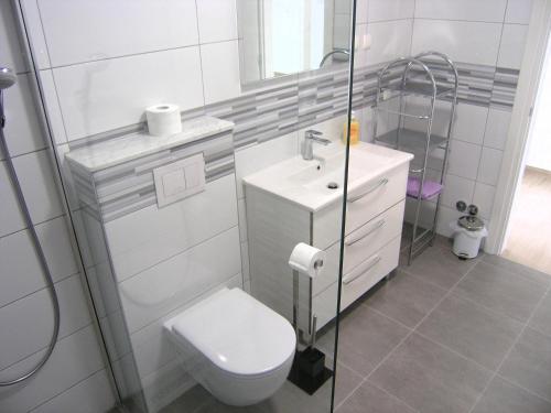 Kúpeľňa v ubytovaní Apartmani Krajinovic