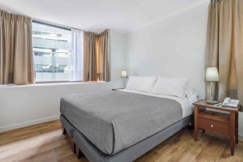 Voodi või voodid majutusasutuse Santa Magdalena Apartments toas