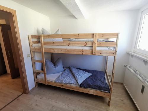 Ένα ή περισσότερα κρεβάτια σε δωμάτιο στο Moderne 3BR Netflix,Kaffee,Wifi,Parken