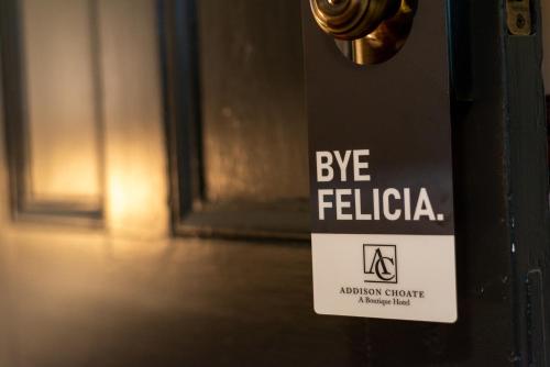 a sign on a door that says big federalica at Addison Choate in Rockport