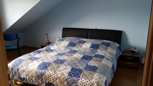 Katil atau katil-katil dalam bilik di Ferienwohnung Am Frankenbach