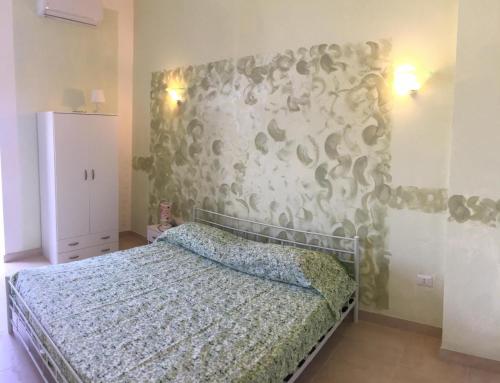Postel nebo postele na pokoji v ubytování Una terrazza sul mare