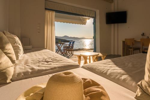Postel nebo postele na pokoji v ubytování Beach Suite Syrma