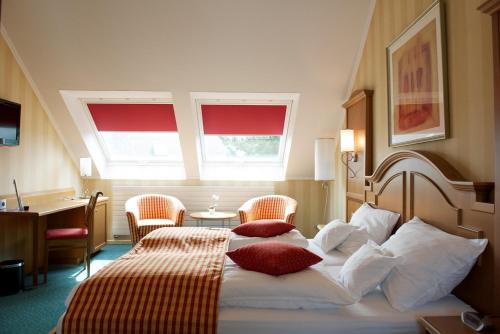 Postel nebo postele na pokoji v ubytování Relax-Hotel Pip-Margraff