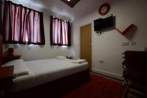 Кровать или кровати в номере Park Hotel