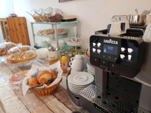 a coffee maker sitting on top of a counter at Hotel Al Foiron in Claviere