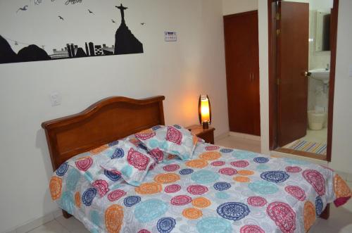 Postel nebo postele na pokoji v ubytování Hotel Plaza Cúcuta Center