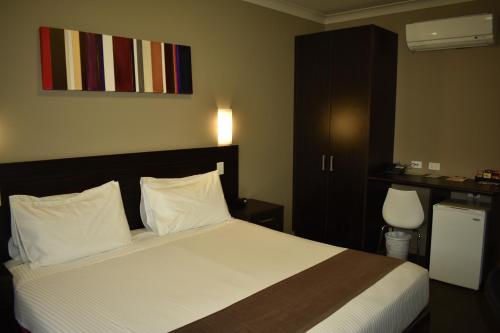 Ένα ή περισσότερα κρεβάτια σε δωμάτιο στο Best Western Blackbutt Inn