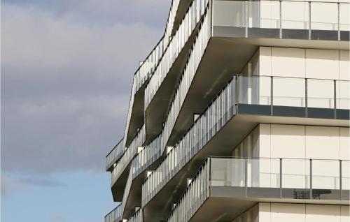 an external view of a building with glass balconies at Highend Travemünde - Whg 203 in Travemünde
